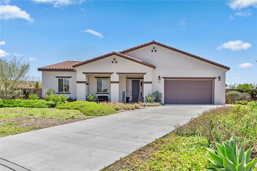 Beautiful single-story former model home’s home with impressive curb appeal.