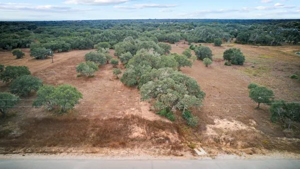 a view of a road with a yard
