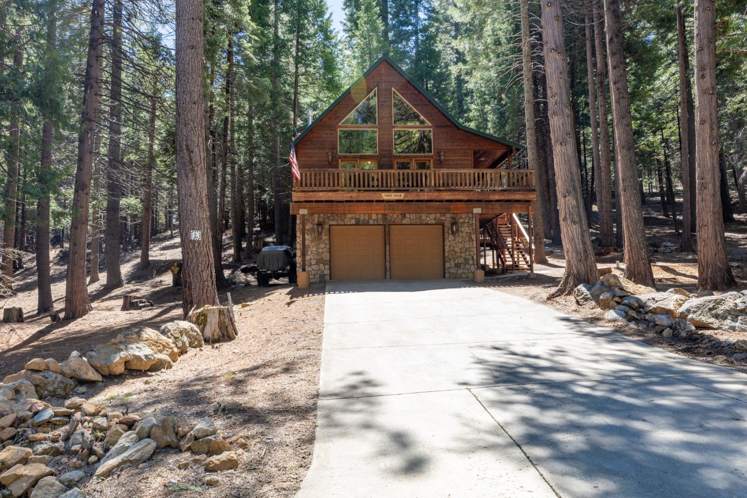 1913 Karock Road Arnold, CA 95223 - Photo 1 of 1 a front view of a house with a yard
