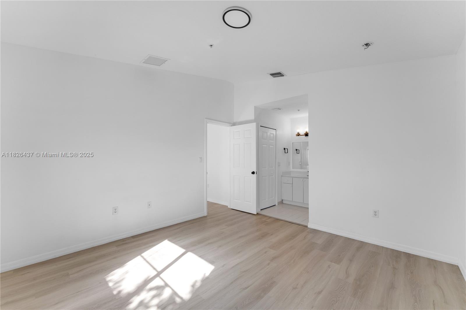 22921 Southwest 88th Place, Unit 301 Cutler Bay, FL 33190 - Photo 14 of 24 a view of an empty room