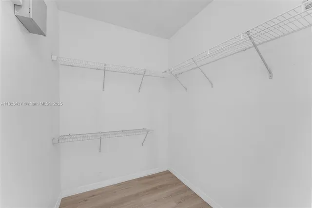 a view of a room with racks on the wall