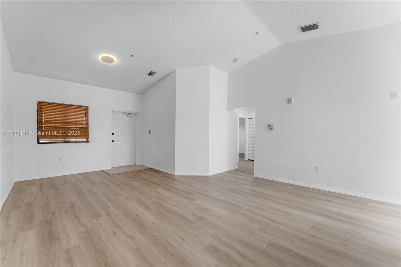 22921 Southwest 88th Place, Unit 301 Cutler Bay, FL 33190 - Photo 6 of 24 a view of an empty room