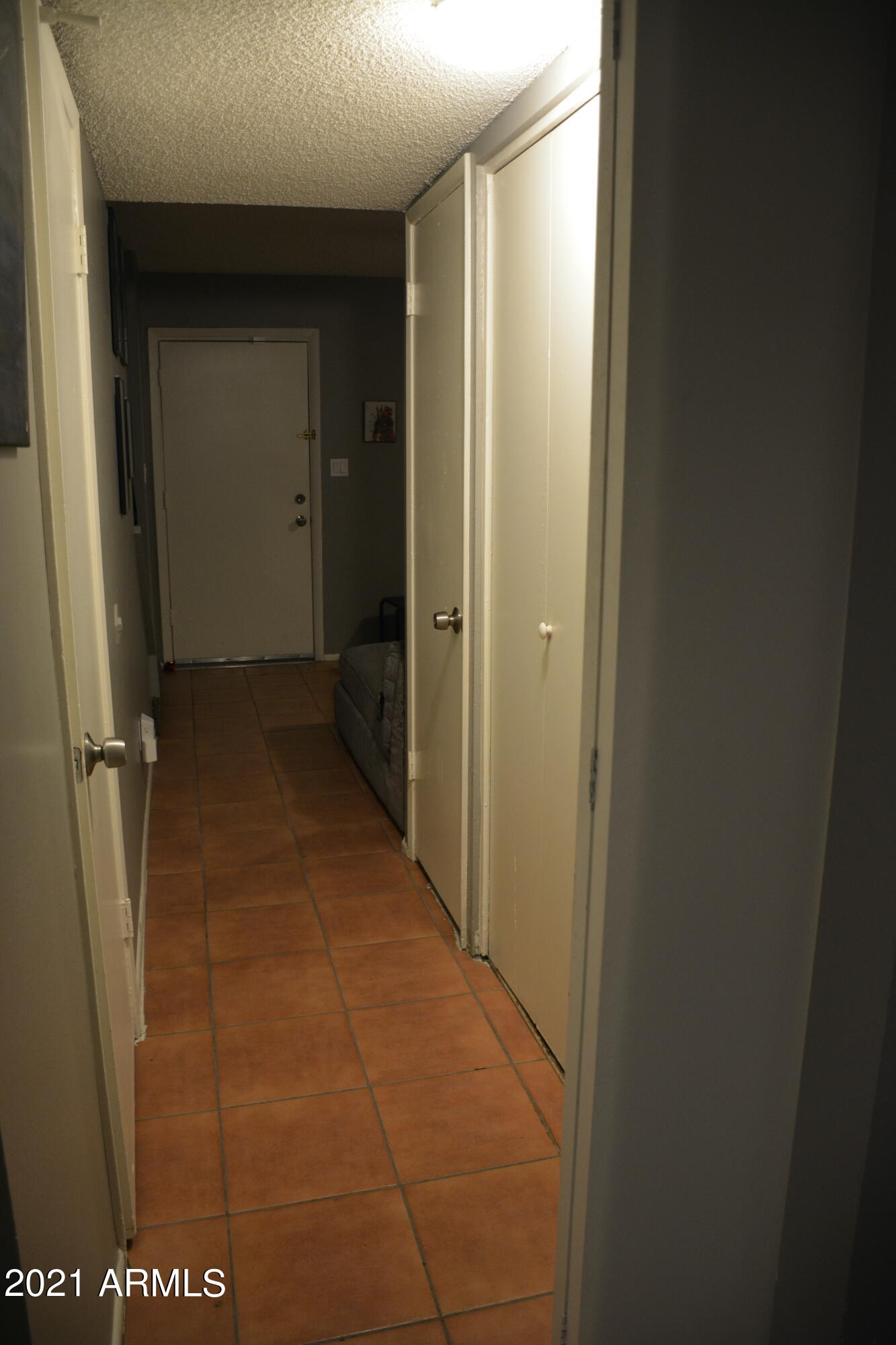 3605 West Bethany Home Road, Unit 28 Phoenix, AZ 85019 - Photo 5 of 11 Hallway facing front door