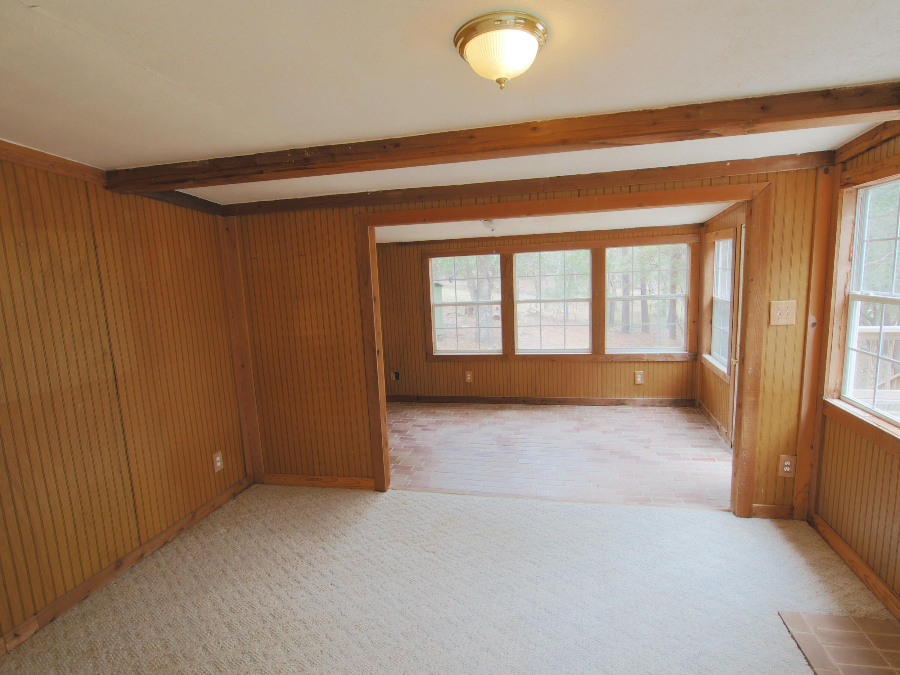 240 Roberts Road East DeFuniak Springs, FL 32433 - Photo 8 of 26 a view of an empty room with a window