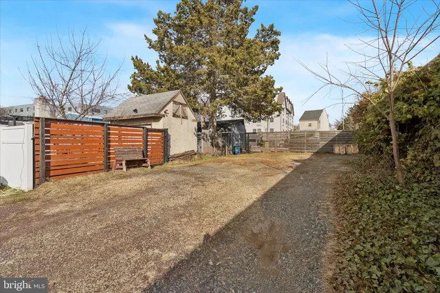 a view of a backyard of the house