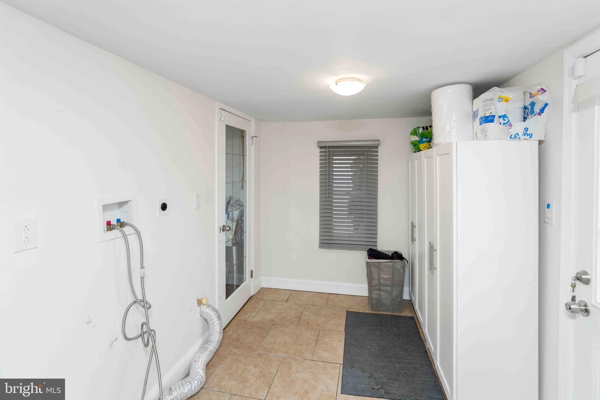 137 Idlewild Road Levittown, PA 19057 - Photo 23 of 34 a view of a hallway with closet and windows