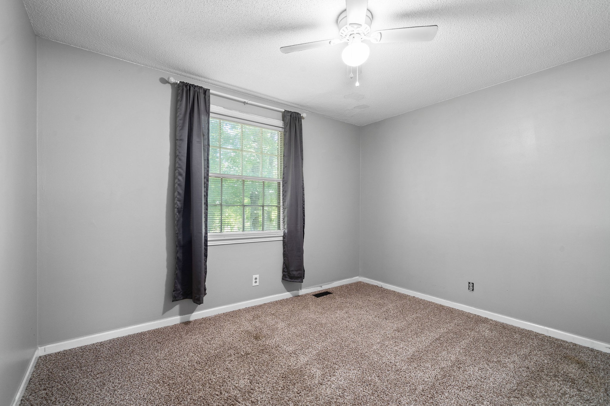 1024 Gratton Road Clarksville, TN 37043 - Photo 17 of 28 a view of an empty room with a window