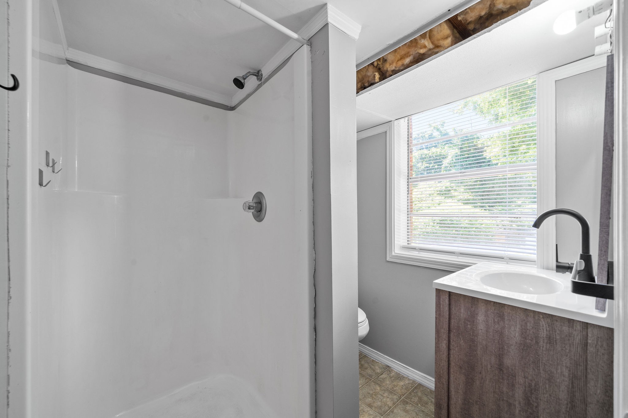 1024 Gratton Road Clarksville, TN 37043 - Photo 23 of 28 a bathroom with a sink a toilet and shower