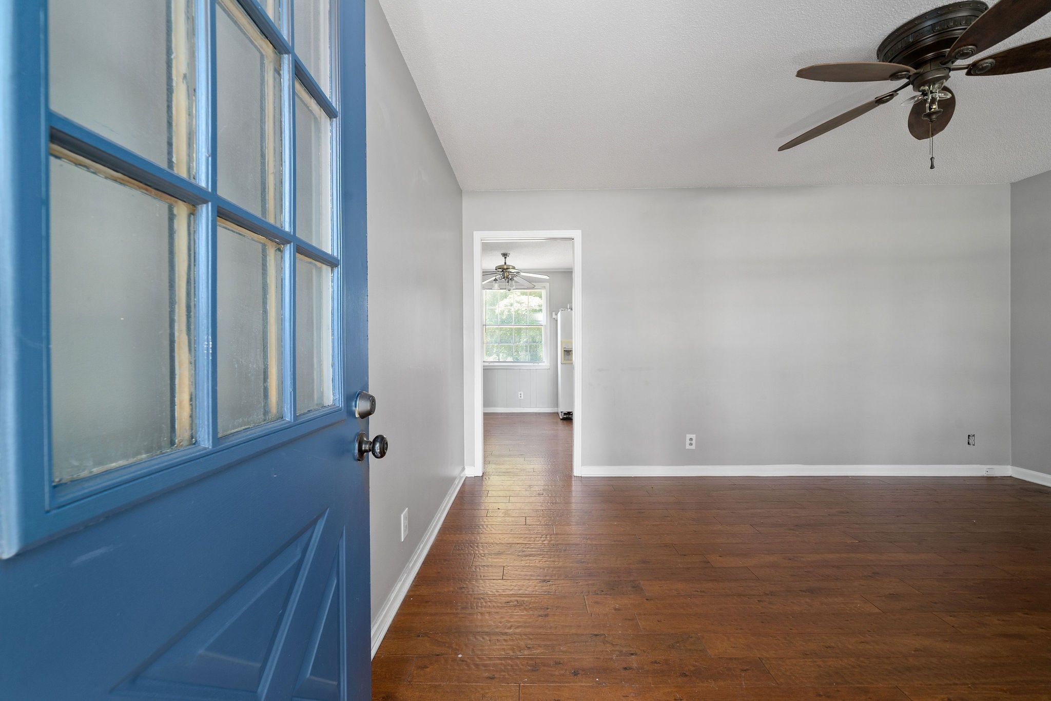 1024 Gratton Road Clarksville, TN 37043 - Photo 5 of 28 a view of a hallway with wooden floor and staircase
