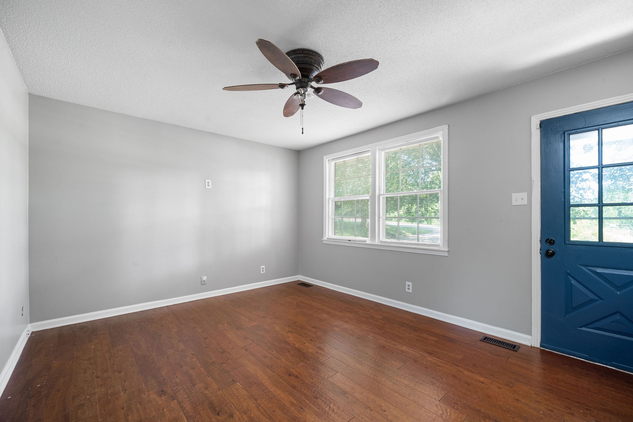 1024 Gratton Road Clarksville, TN 37043 - Photo 9 of 28 wooden floor in an empty room with a window