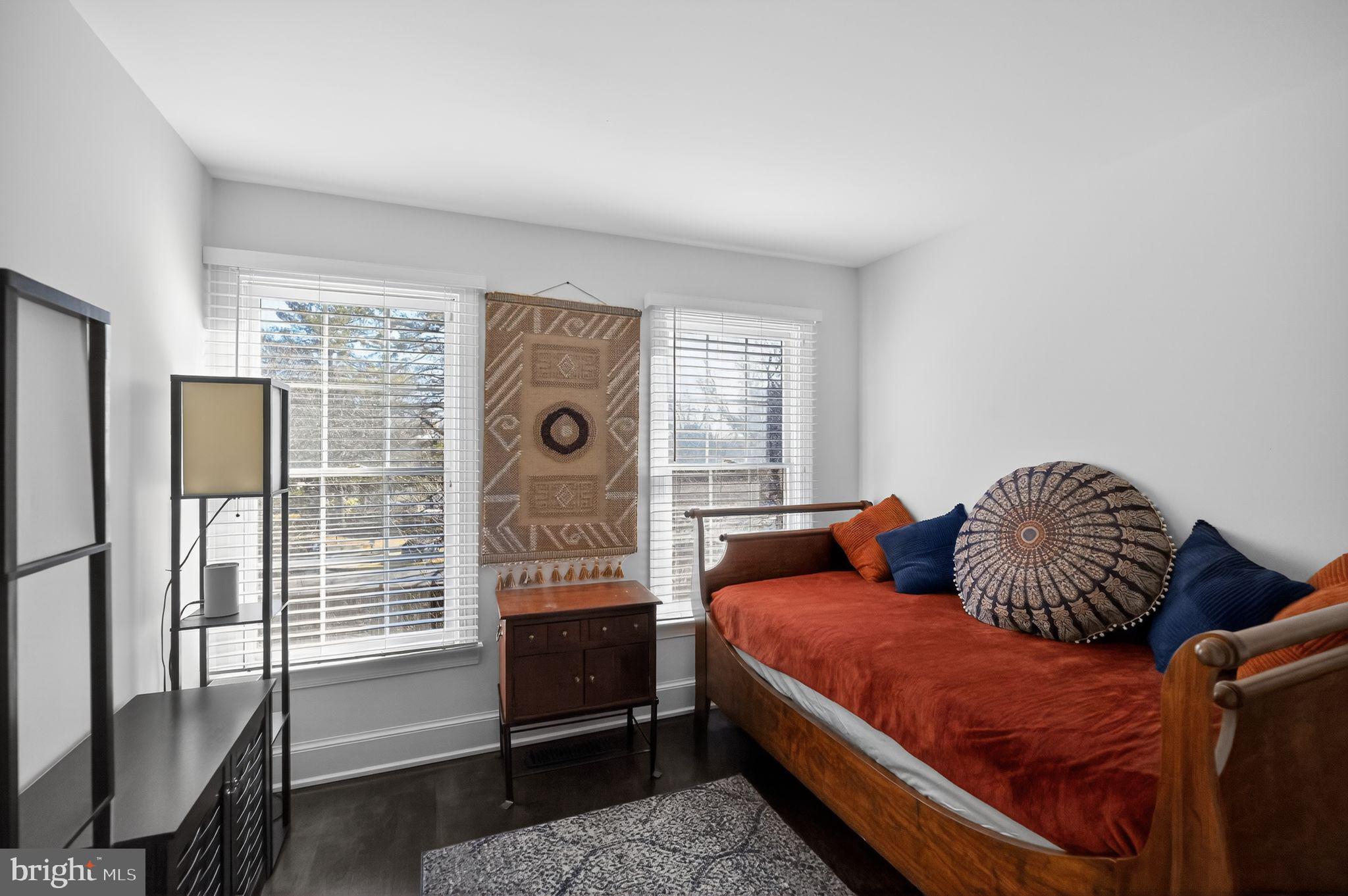 128 Rees Place Falls Church, VA 22046 - Photo 33 of 47 a bedroom with a bed and wooden floor