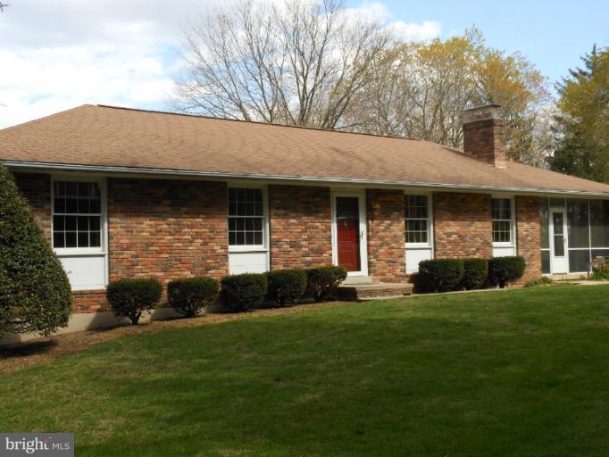 21315 Middletown Road Freeland, MD 21053 - Photo 28 of 30 a front view of a house with a garden