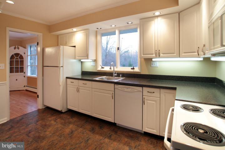 21315 Middletown Road Freeland, MD 21053 - Photo 5 of 30 a kitchen with a sink and cabinets