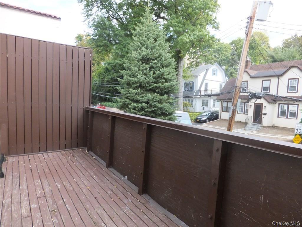 107 Kensington Road, Unit 5 Bronxville, NY 10708 - Photo 13 of 17 View of wooden deck