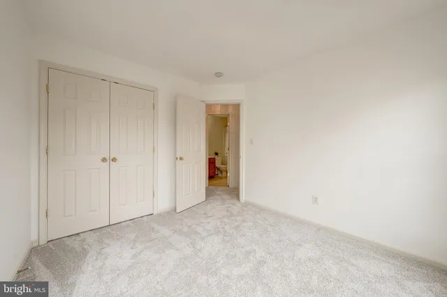 a view of balcony with wooden floor and fence