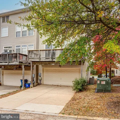 a view of a house with a gate