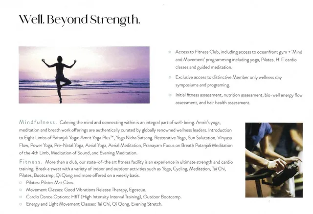 a view of a dining room with furniture large windows and a chandelier