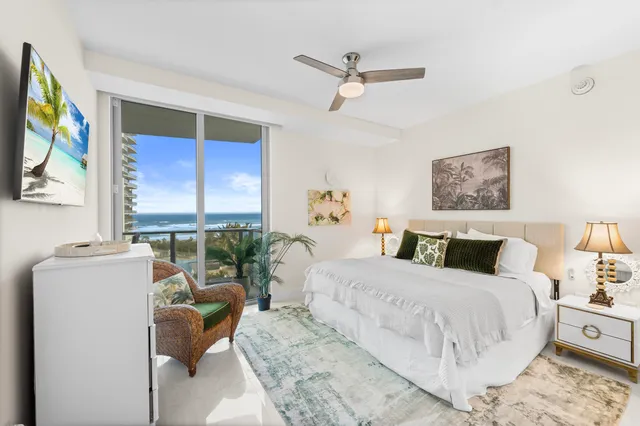 a bathroom with a double vanity sink a mirror and a bathtub