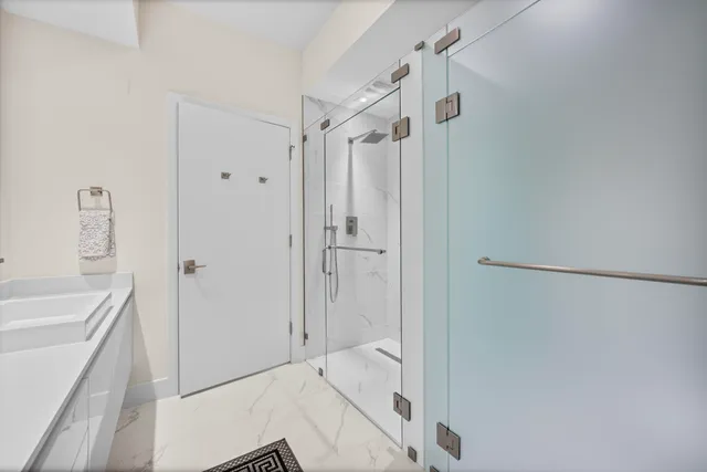 a bathroom with a sink a toilet and vanity