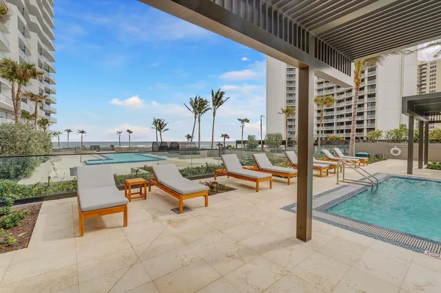 an aerial view of multi story residential apartment building