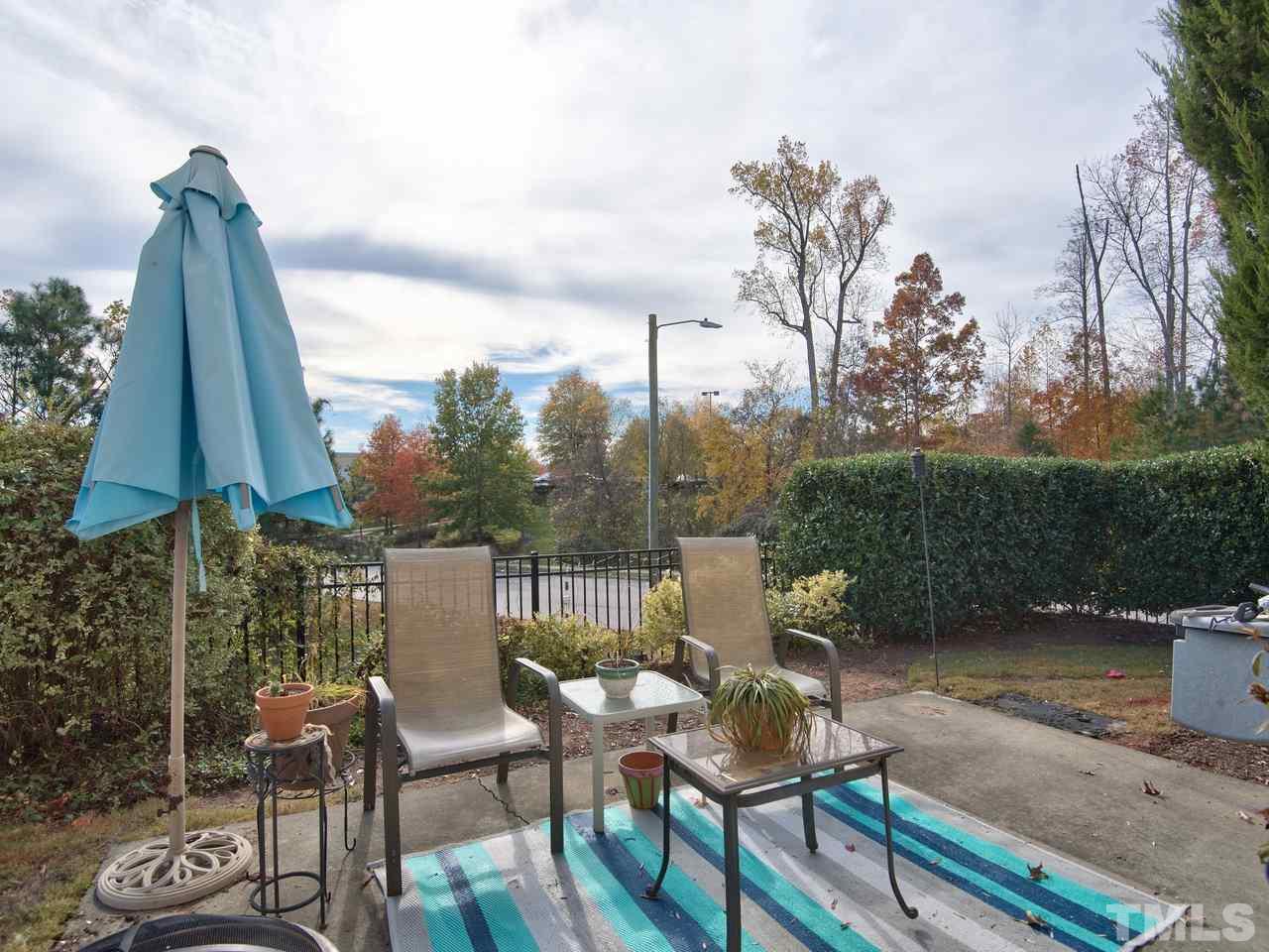 8415 Stonework Drive Raleigh, NC 27613 - Photo 24 of 24 a view of a chairs and table in patio