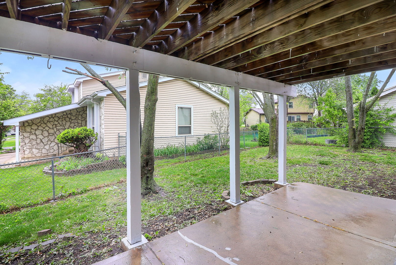 1914 Brookside Lane Hoffman Estates, IL 60169 - Photo 15 of 16 a view of a porch with a backyard