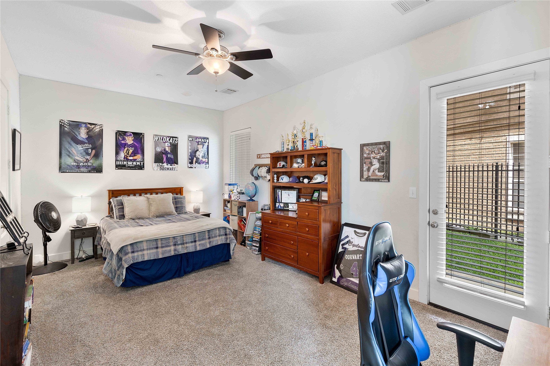 11434 Ketch Court Willis, TX 77318 - Photo 37 of 50 a bedroom with a bed furniture and a window
