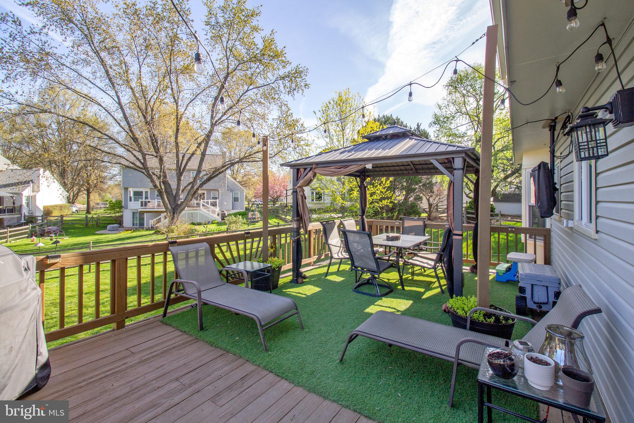 9717 Noble Ridge Terrace Gaithersburg, MD 20882 - Photo 33 of 48 Large Deck off Kitchen with Stairs to the Backyard