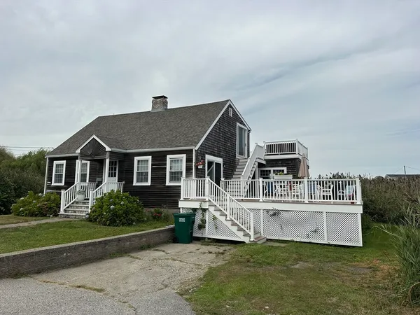 a house that has a big yard and more windows