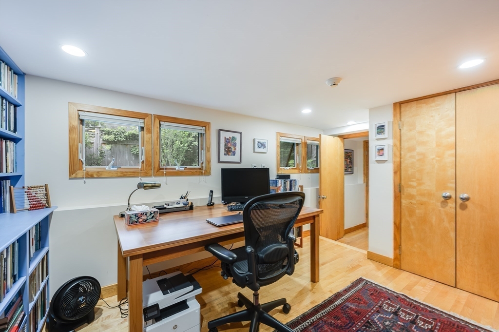 22 Decatur Street, Unit 20 Cambridge, MA 02139 - Photo 15 of 22 a view of a workspace with furniture and a window
