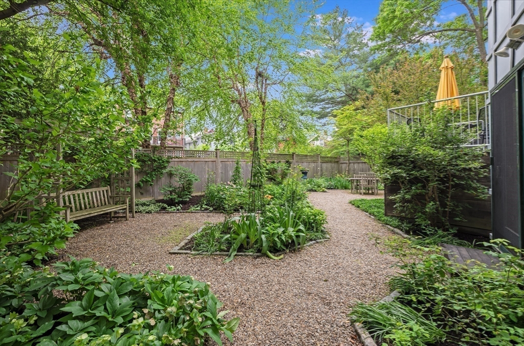 22 Decatur Street, Unit 20 Cambridge, MA 02139 - Photo 18 of 22 a view of a pathway with a bench
