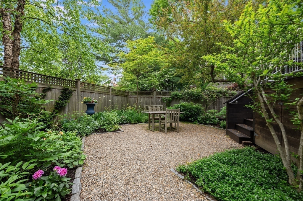 22 Decatur Street, Unit 20 Cambridge, MA 02139 - Photo 19 of 22 a view of a chair and table in the garden