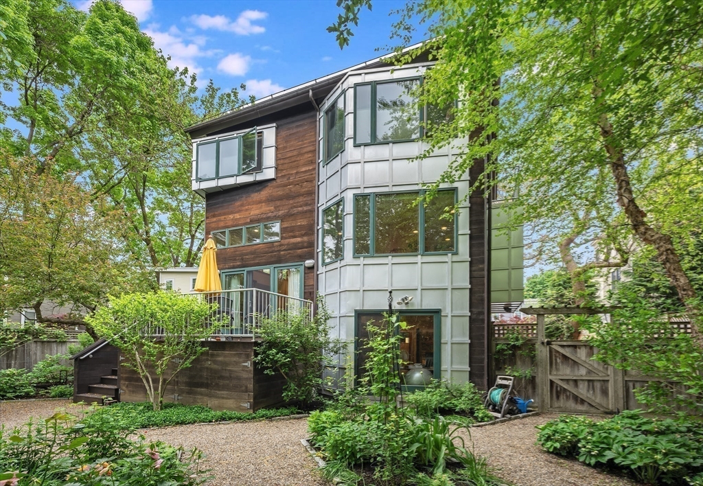 22 Decatur Street, Unit 20 Cambridge, MA 02139 - Photo 21 of 22 a front view of a house with a garden