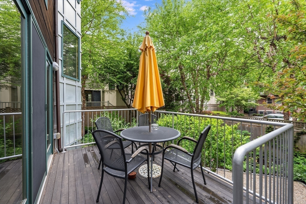 22 Decatur Street, Unit 20 Cambridge, MA 02139 - Photo 22 of 22 a view of a chair and table in the balcony