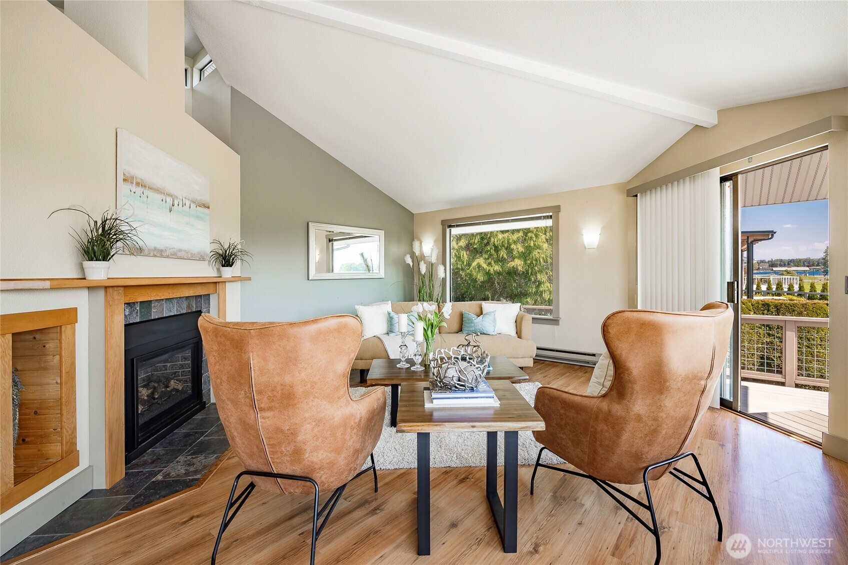 5537 Salish Road Blaine, WA 98230 - Photo 20 of 39 a dining room with furniture a window and wooden floor