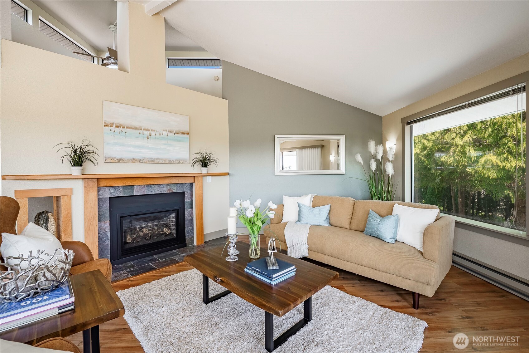 5537 Salish Road Blaine, WA 98230 - Photo 21 of 39 a living room with furniture and a fireplace