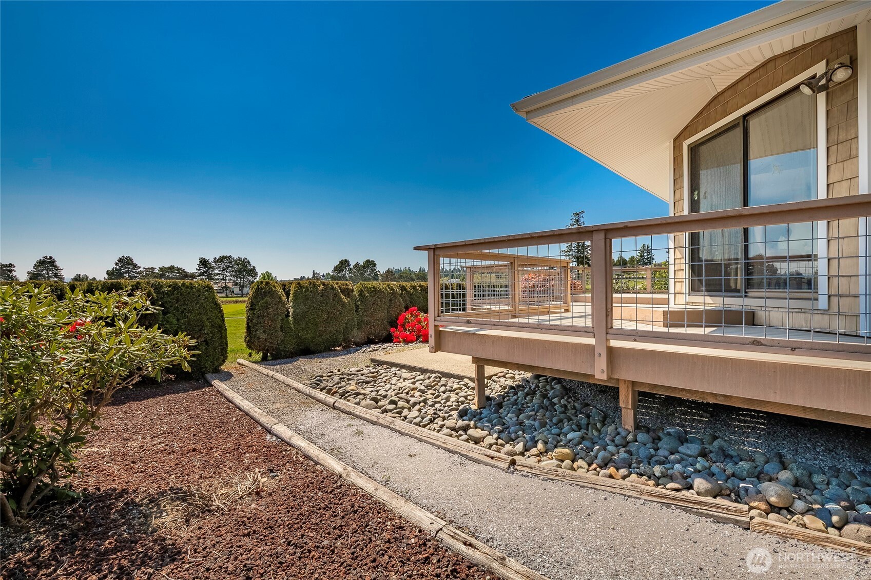 5537 Salish Road Blaine, WA 98230 - Photo 28 of 39 a house view with a backyard space