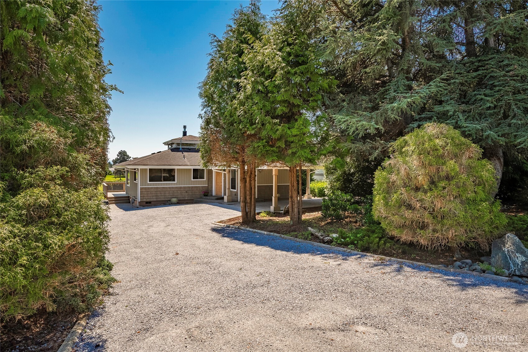 5537 Salish Road Blaine, WA 98230 - Photo 5 of 39 a front view of a house with a yard