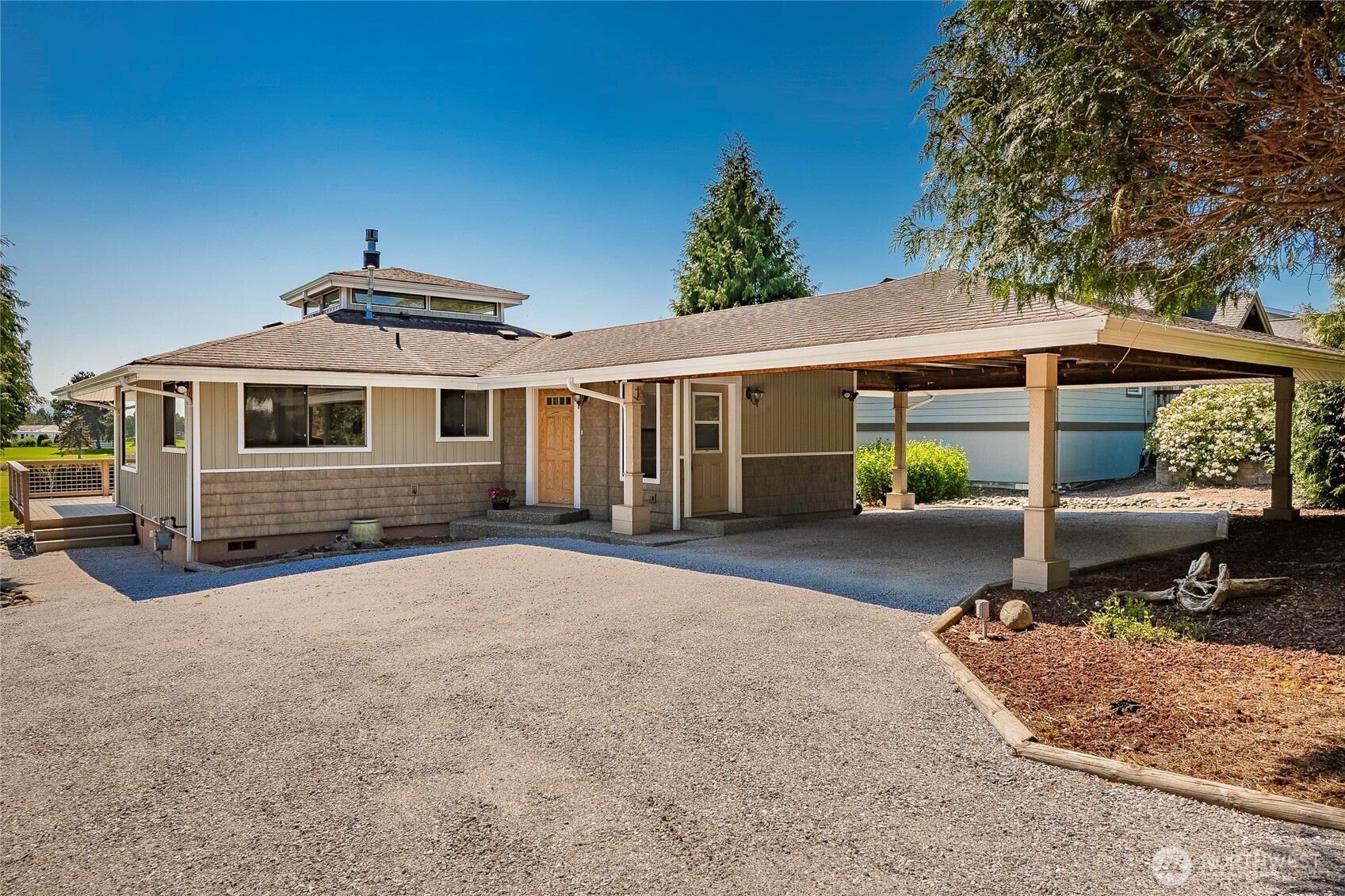 5537 Salish Road Blaine, WA 98230 - Photo 6 of 39 a front view of a house with a yard