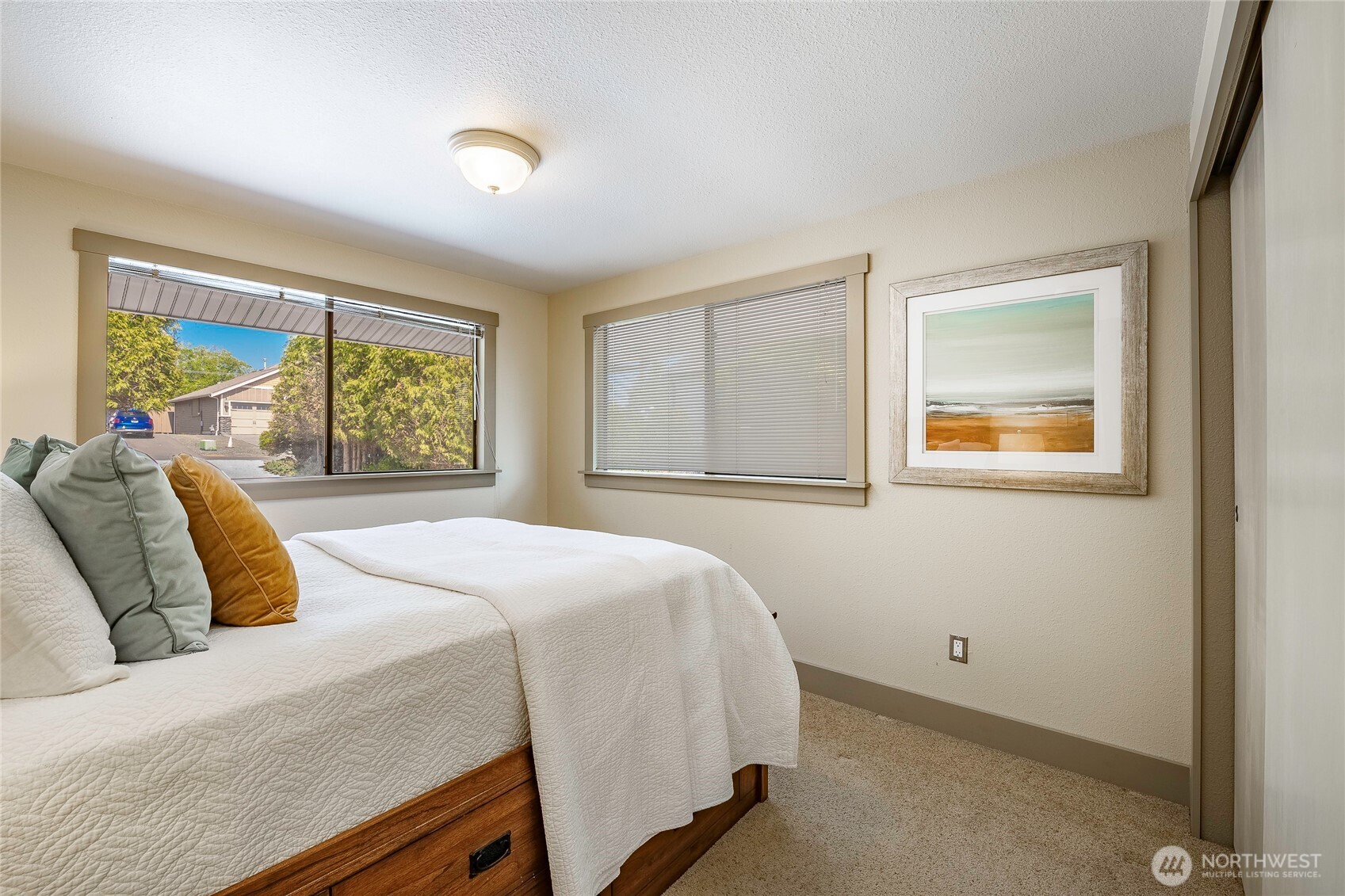 5537 Salish Road Blaine, WA 98230 - Photo 9 of 39 a bedroom with a bed and a window