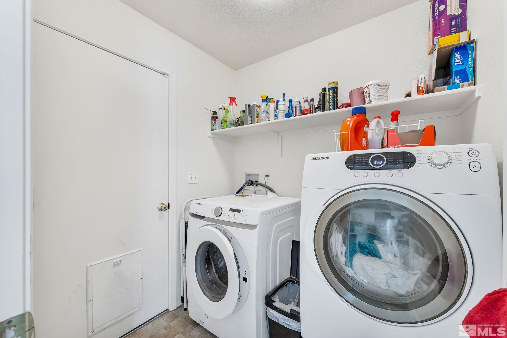 17541 Desert Lake Drive Reno, NV 89508 - Photo 23 of 33 a utility room with dryer and washer