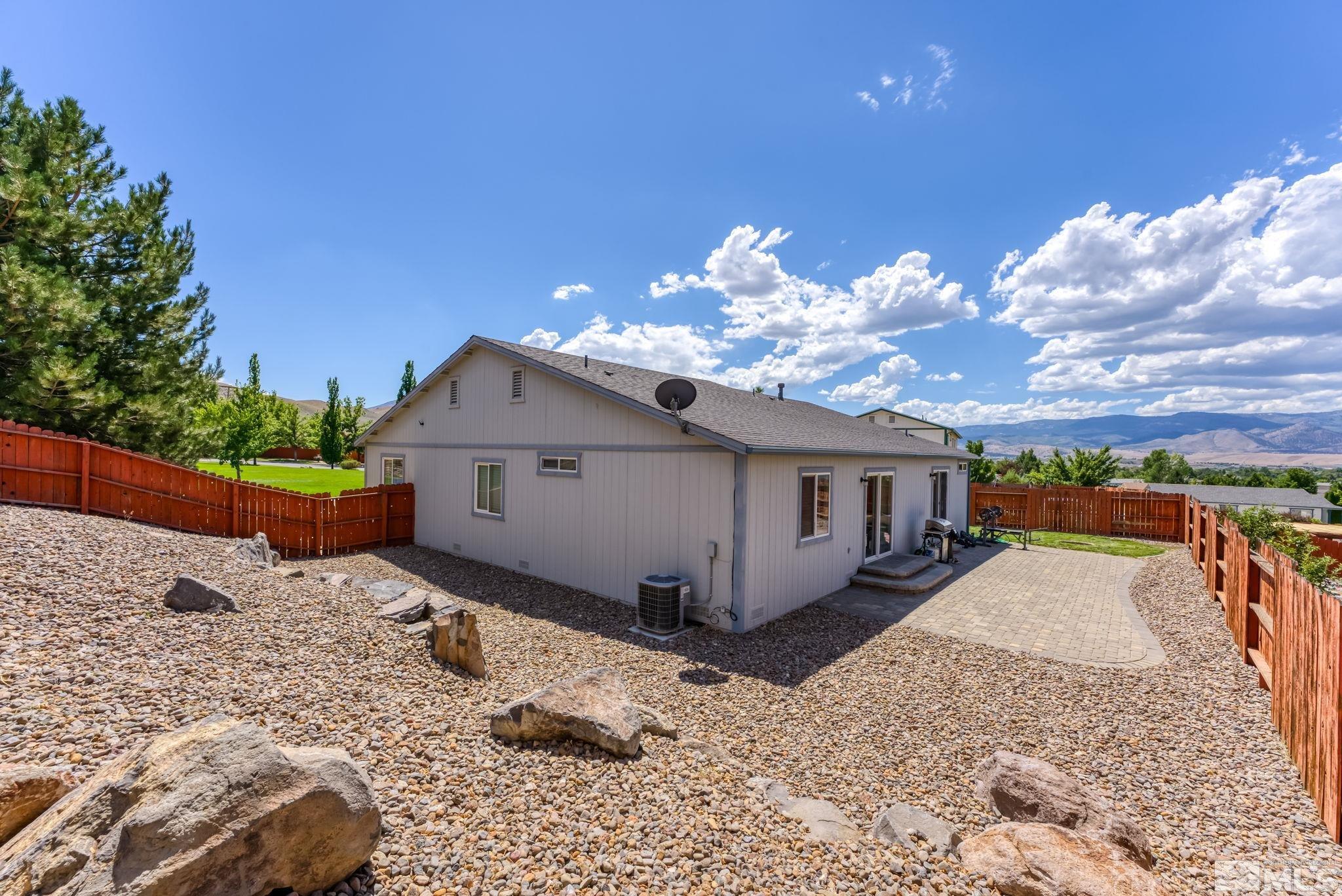 17541 Desert Lake Drive Reno, NV 89508 - Photo 25 of 33 a view of a house with a snow in the yard