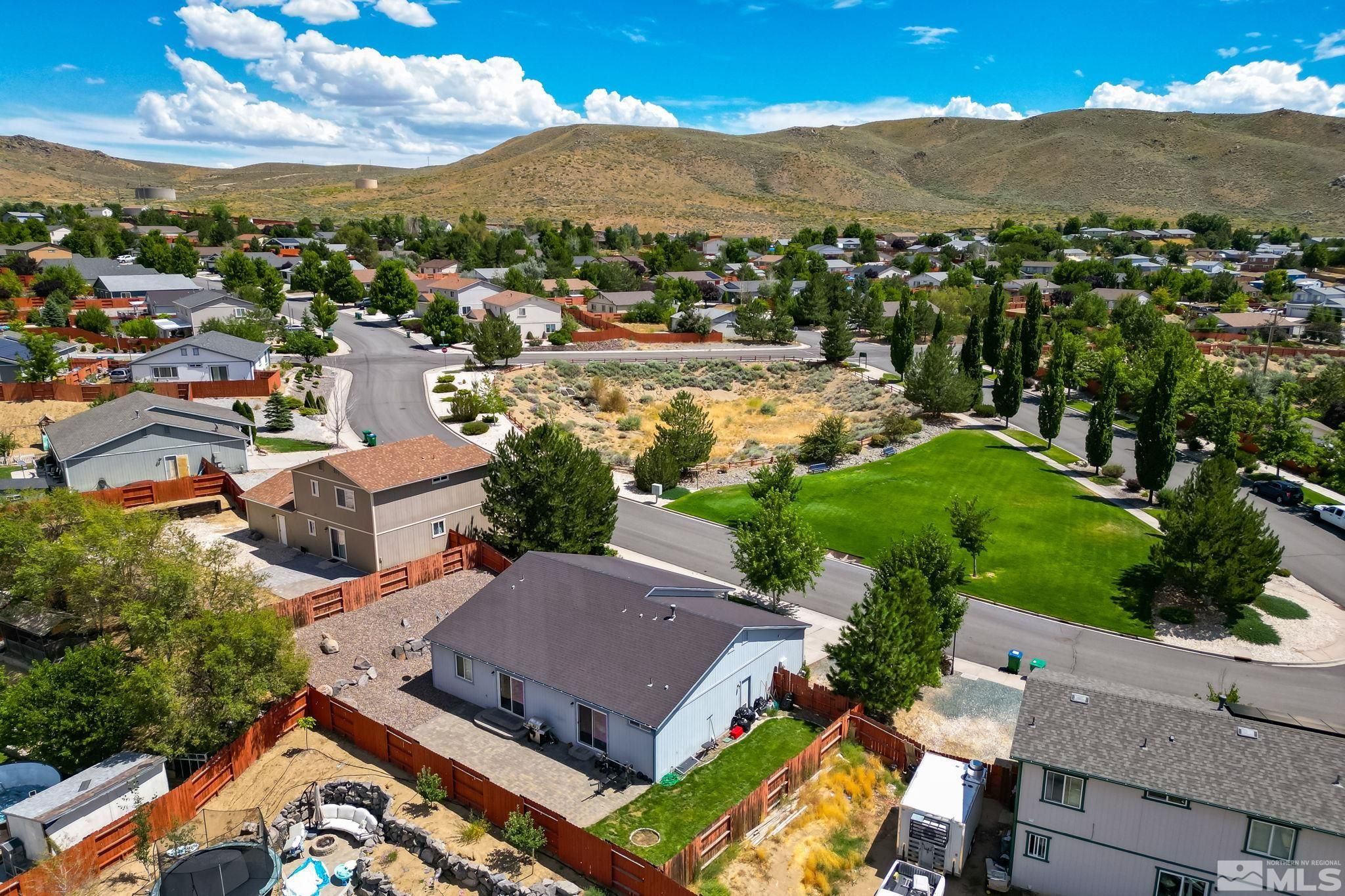 17541 Desert Lake Drive Reno, NV 89508 - Photo 29 of 33 an aerial view of residential houses with outdoor space and river