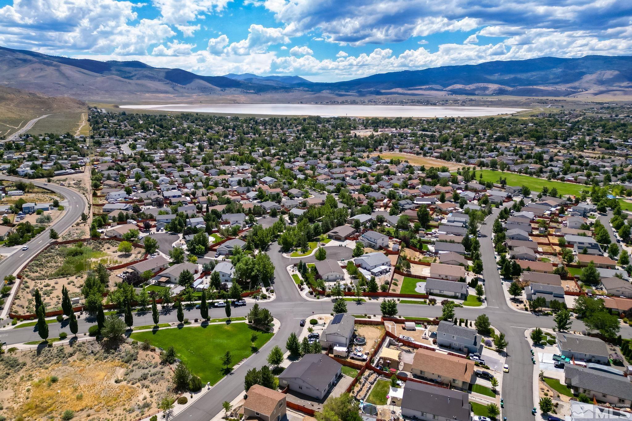17541 Desert Lake Drive Reno, NV 89508 - Photo 32 of 33 an aerial view of residential houses with city view