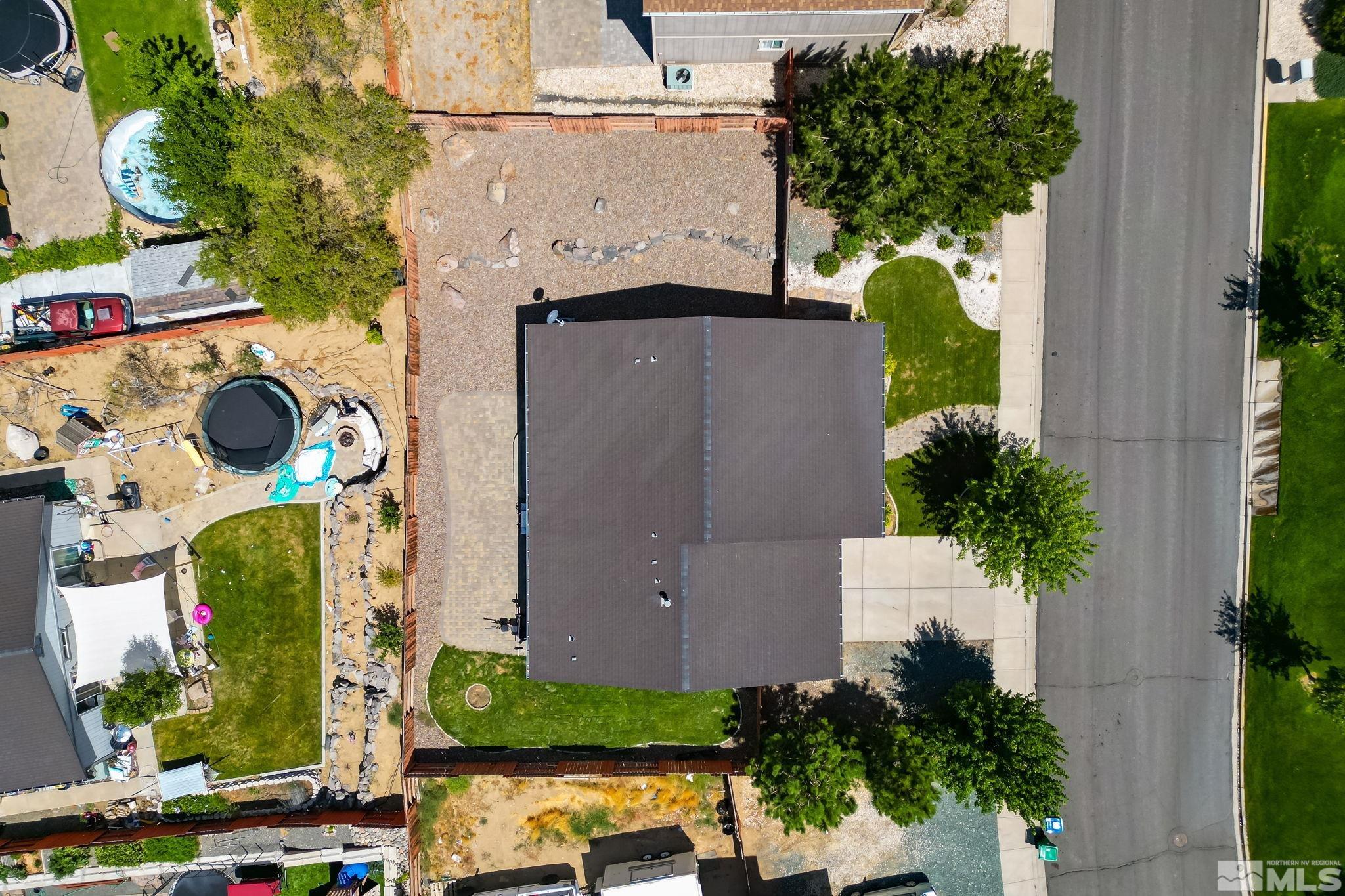 17541 Desert Lake Drive Reno, NV 89508 - Photo 33 of 33 an aerial view of a house with a yard and a large tree