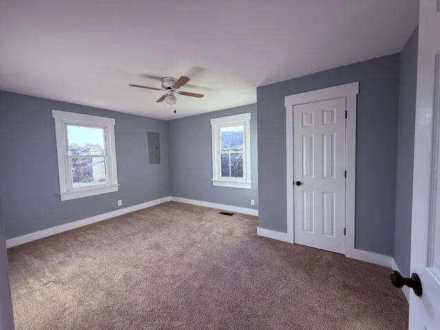 an empty room with windows