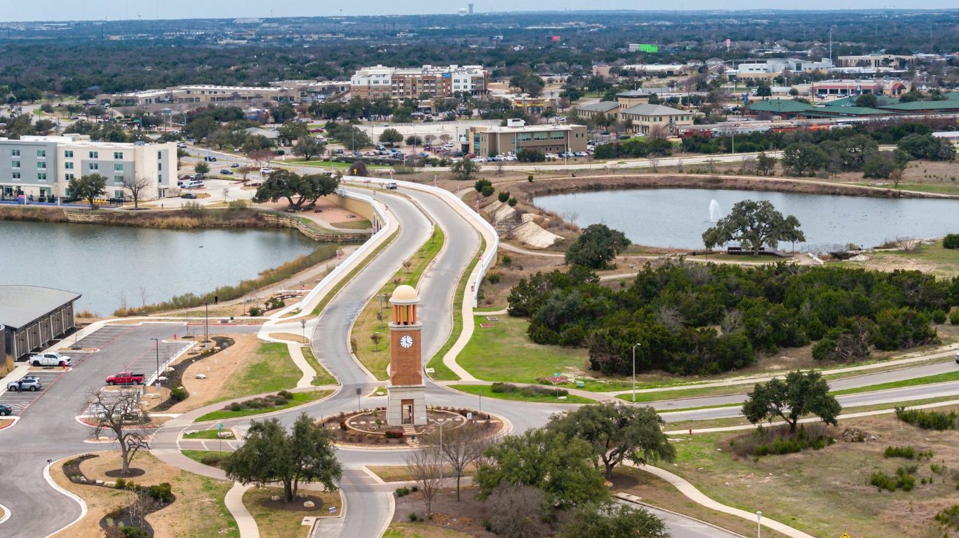 600 C-Bar Ranch Trail, Unit 136 Cedar Park, TX 78613 - Photo 8 of 9 an aerial view of a city with lake view
