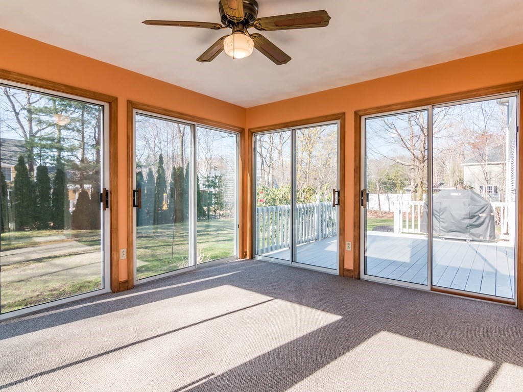 7 Old Town Road Beverly, MA 01915 - Photo 23 of 35 a bedroom with furniture and large windows