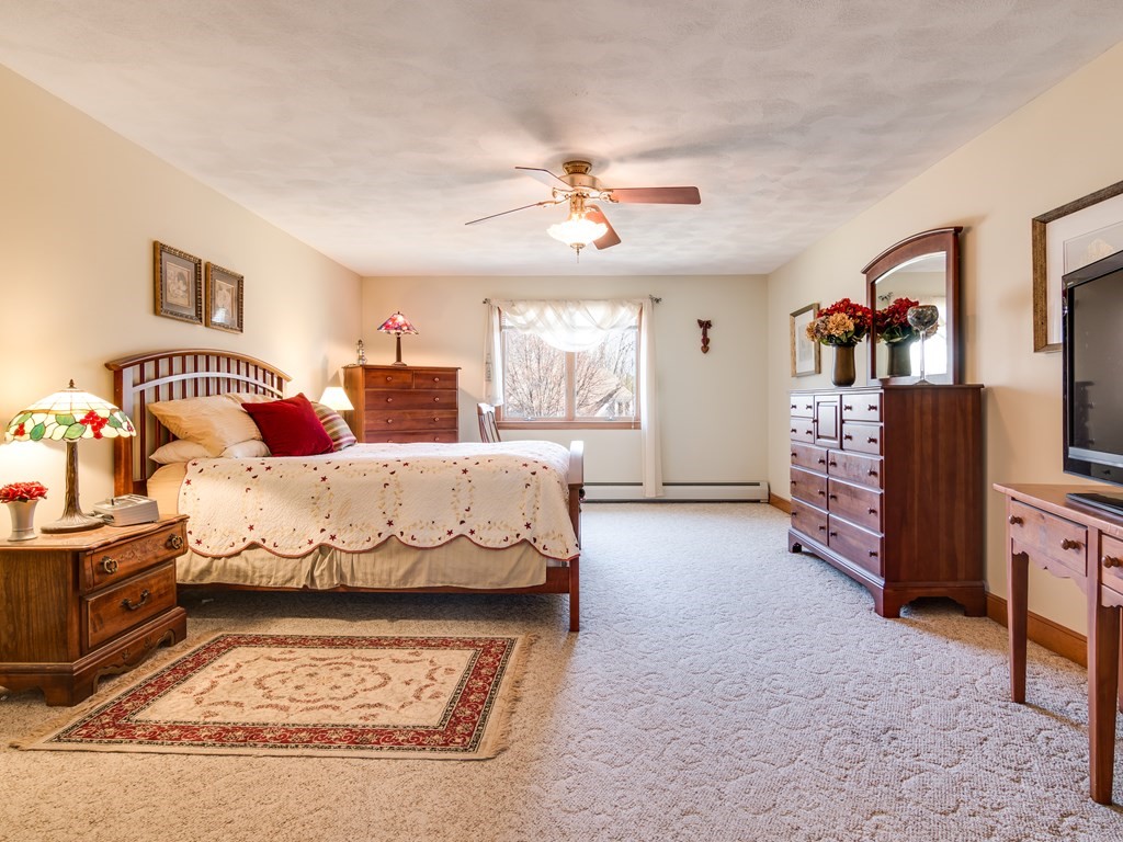 7 Old Town Road Beverly, MA 01915 - Photo 27 of 35 a bedroom with a bed and a flat screen tv