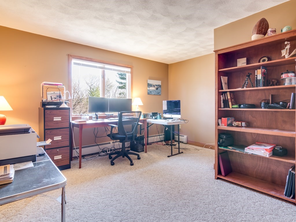 7 Old Town Road Beverly, MA 01915 - Photo 31 of 35 a view of a livingroom with workspace and a window